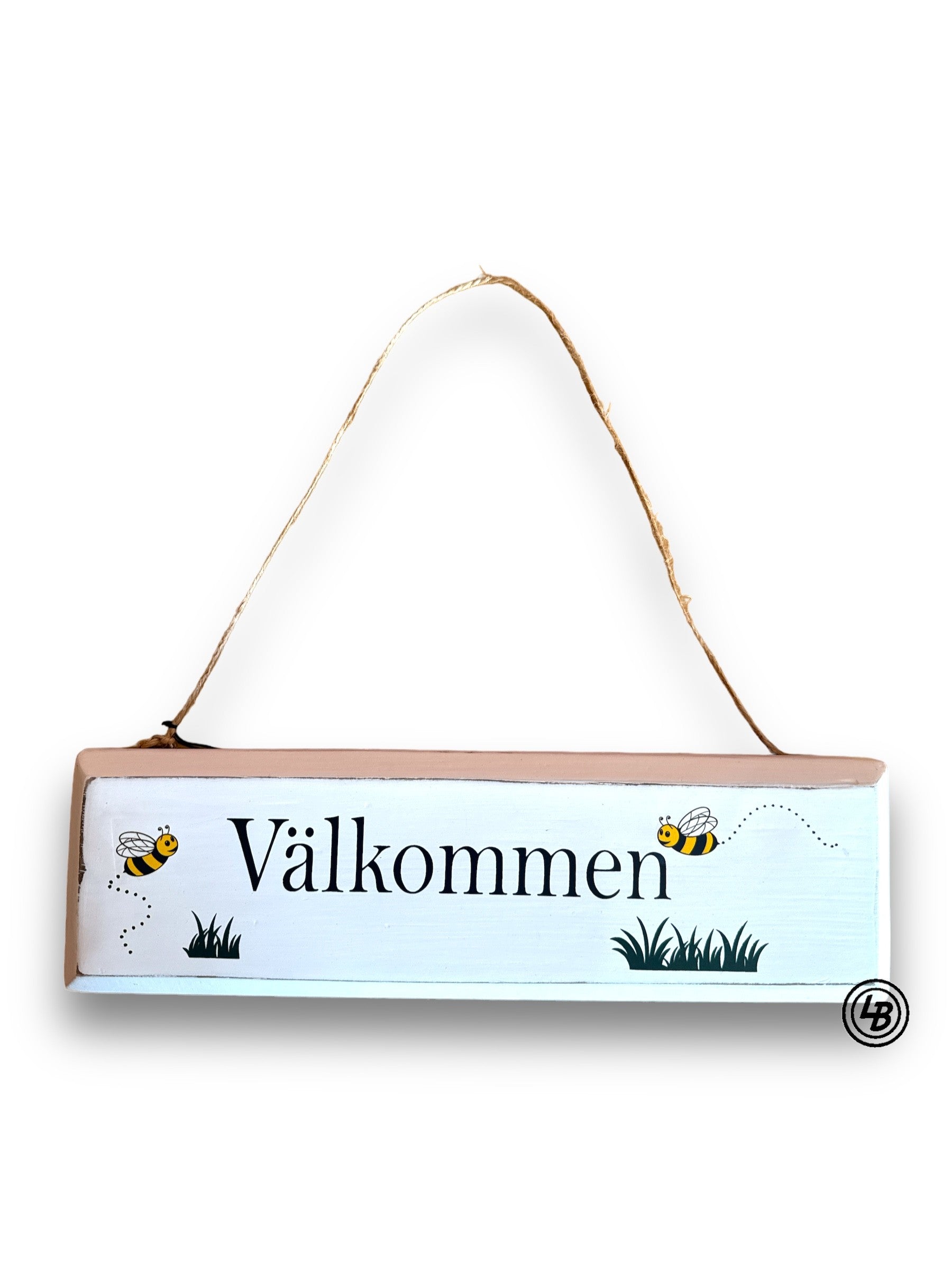 Hängande skylt "Välkommen"
