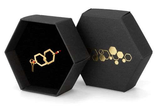 Armband dubbelhexagon guld med rött band