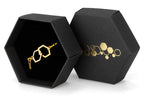 Armband dubbelhexagon guld med guldband