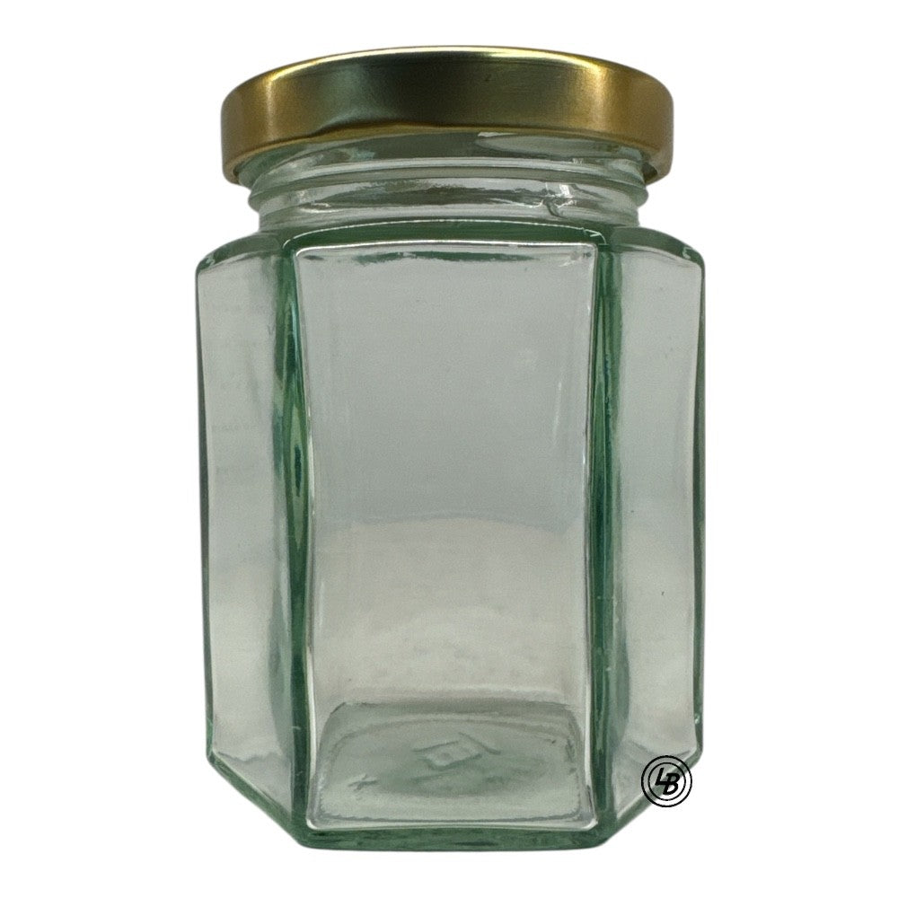Glas 6-kant 250gr/196ml 3762st/pall inkl lock 58mm